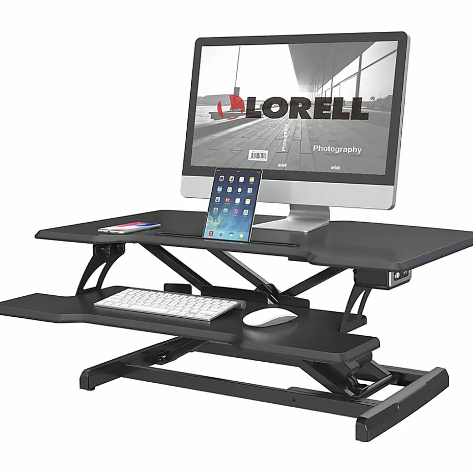 Lorell® Electric Monitor Desk Riser With Wireless Charging Pad, 20"H x 33-1/2"W x 19-1/3"D, Black